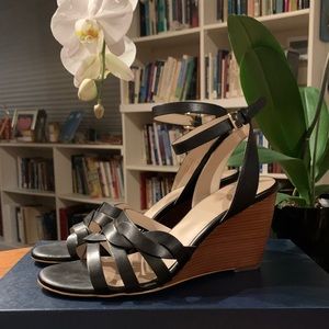 Black Cole Haan wedges.